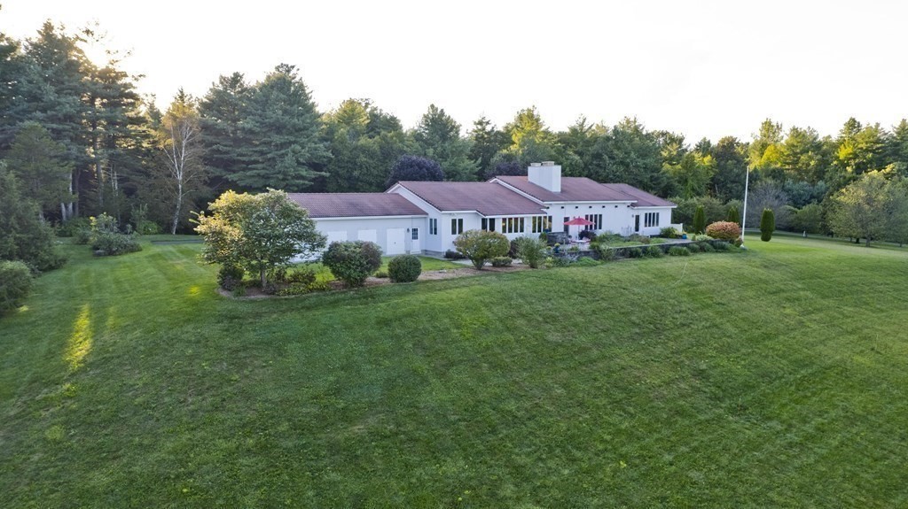 175 N Road Westfield, MA 01085 - Photo 1 of 41 a front view of a house with garden