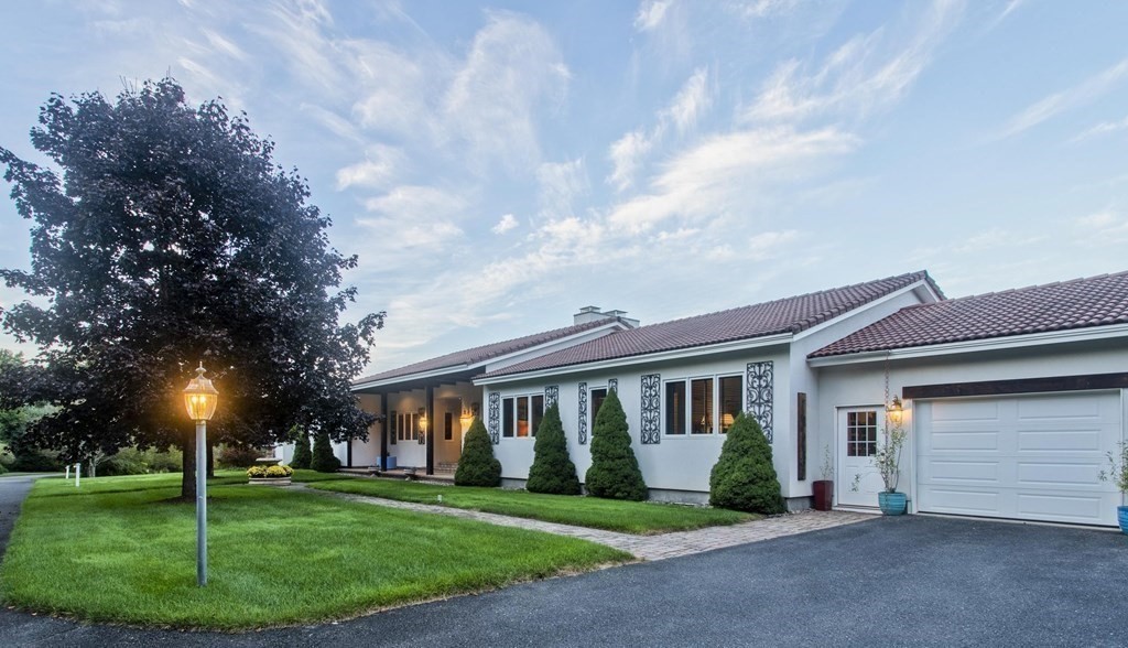 175 N Road Westfield, MA 01085 - Photo 3 of 41 a view of a big house with a big yard and large trees