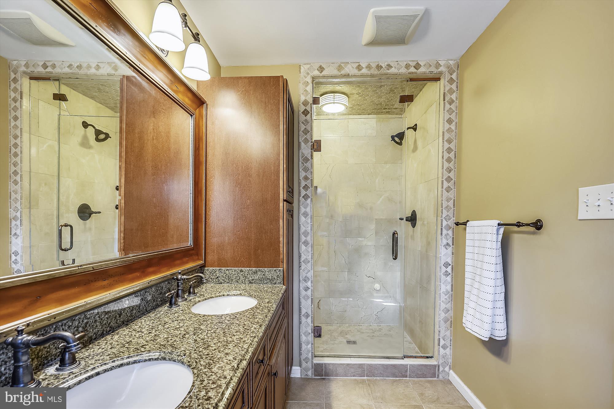 105 Stauffer Road Severna Park, MD 21146 - Photo 33 of 68 Master Bed with steam shower & beautiful tile work
