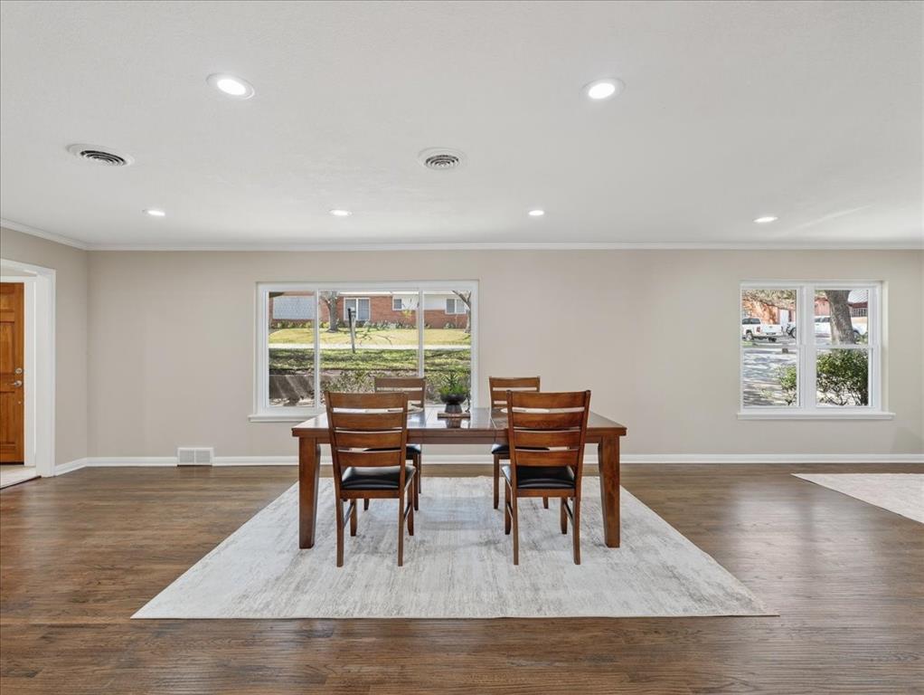 3863 Clayton Road East Fort Worth, TX 76116 - Photo 5 of 39 a view of a dining room with furniture and wooden floor