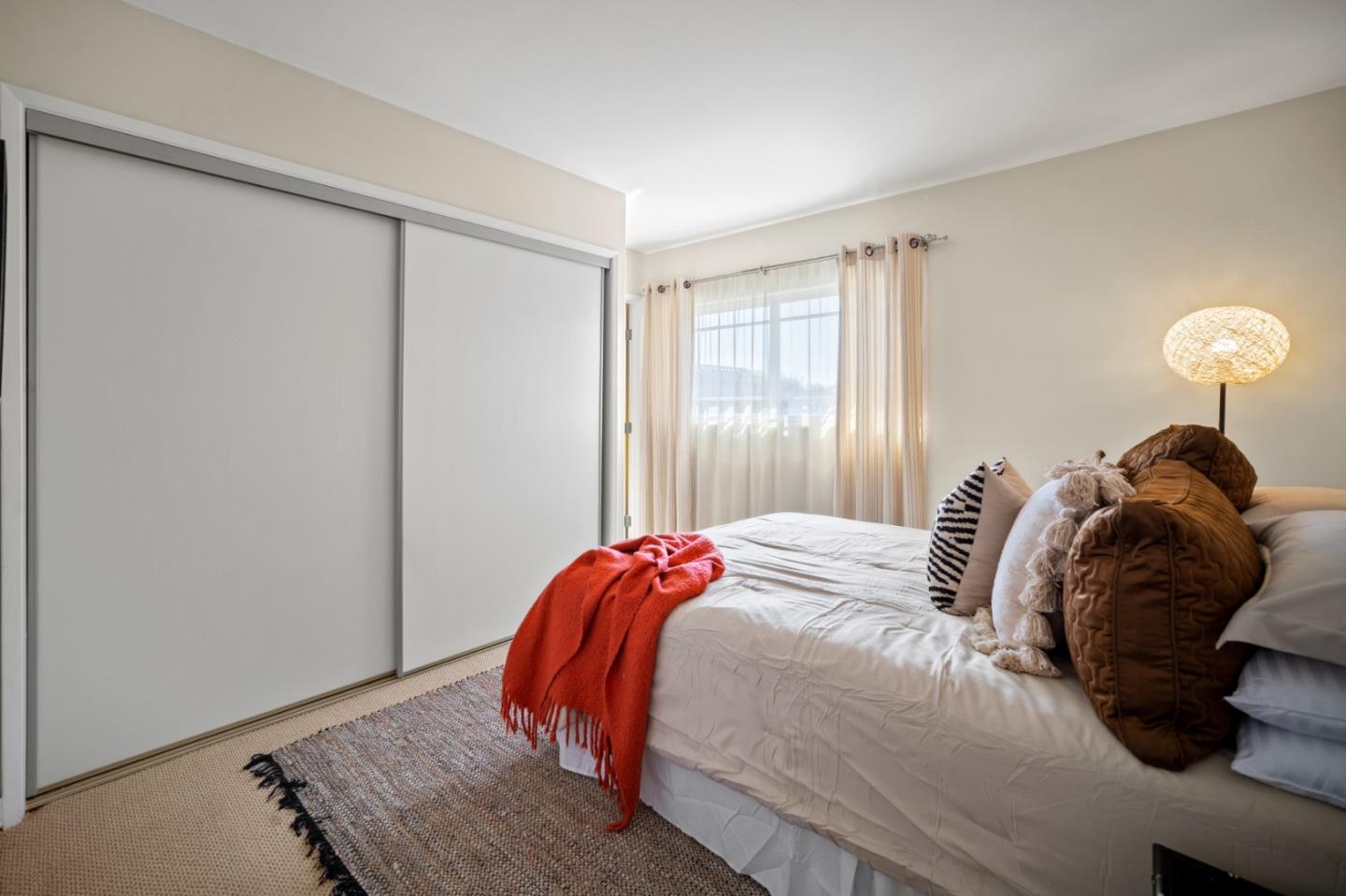 1717 Harding Street Seaside, CA 93955 - Photo 16 of 28 a bedroom with a bed and a window