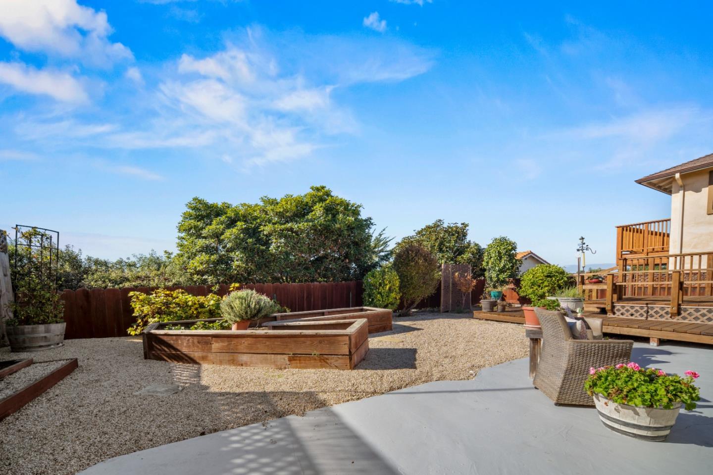 1717 Harding Street Seaside, CA 93955 - Photo 25 of 28 a view of a swimming pool with outdoor seating and plants