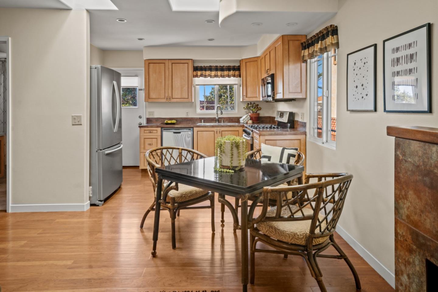 1717 Harding Street Seaside, CA 93955 - Photo 3 of 28 a view of a dining room with furniture and wooden floor