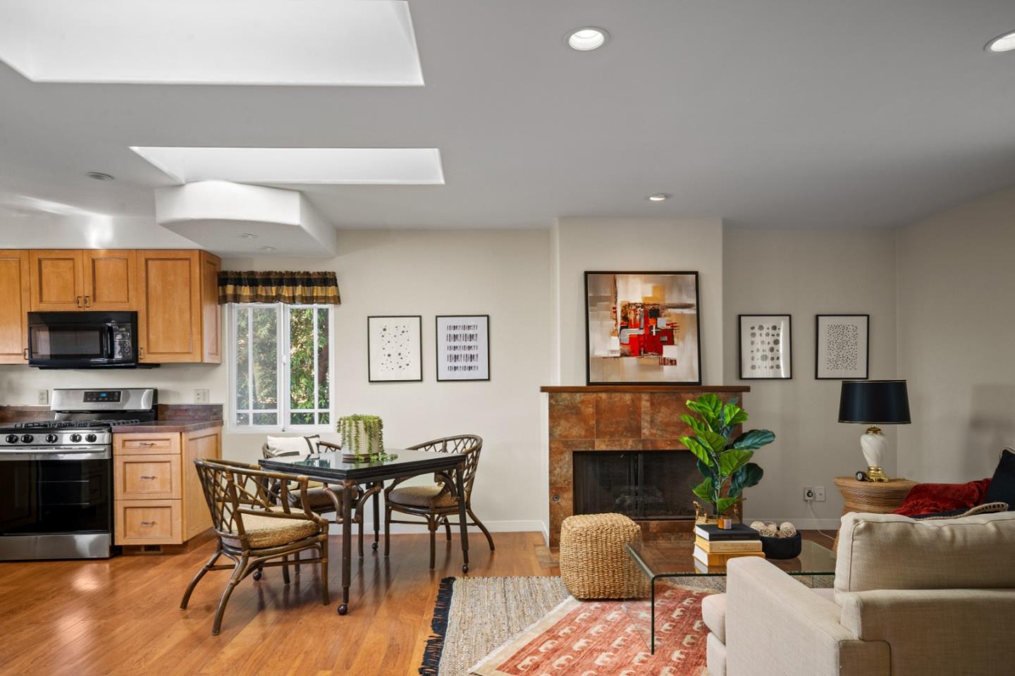 1717 Harding Street Seaside, CA 93955 - Photo 7 of 28 a living room with furniture a flat screen tv and a fireplace