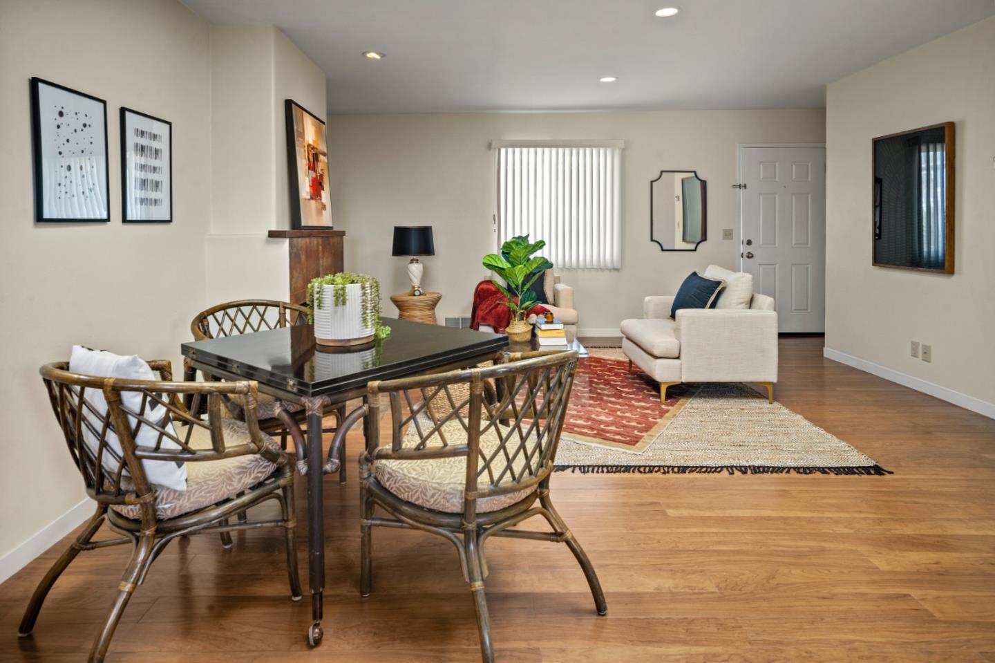 1717 Harding Street Seaside, CA 93955 - Photo 10 of 28 a view of a dining room with furniture a rug and wooden floor