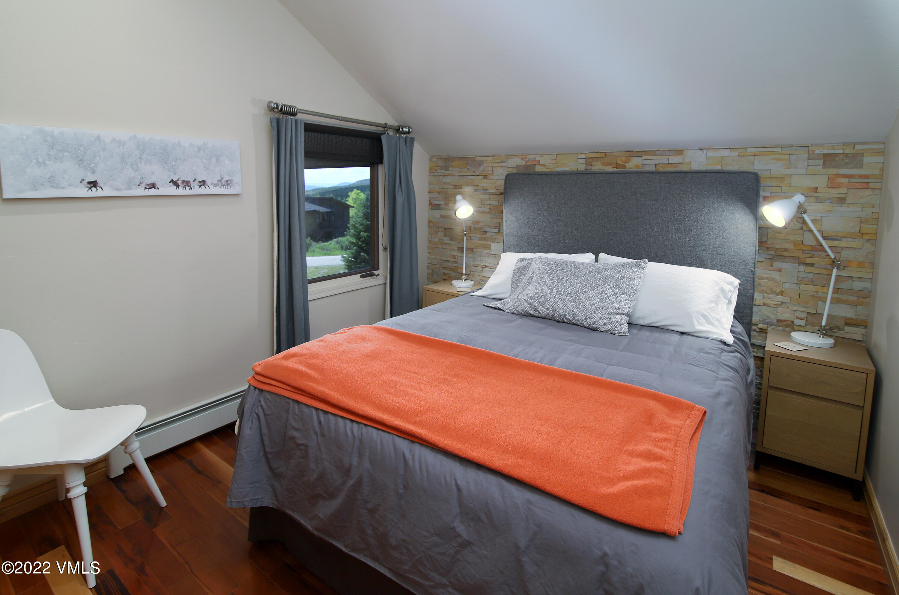 4530 Flat Point, Unit A Avon, CO 81620 - Photo 12 of 22 a bedroom with a bed and window