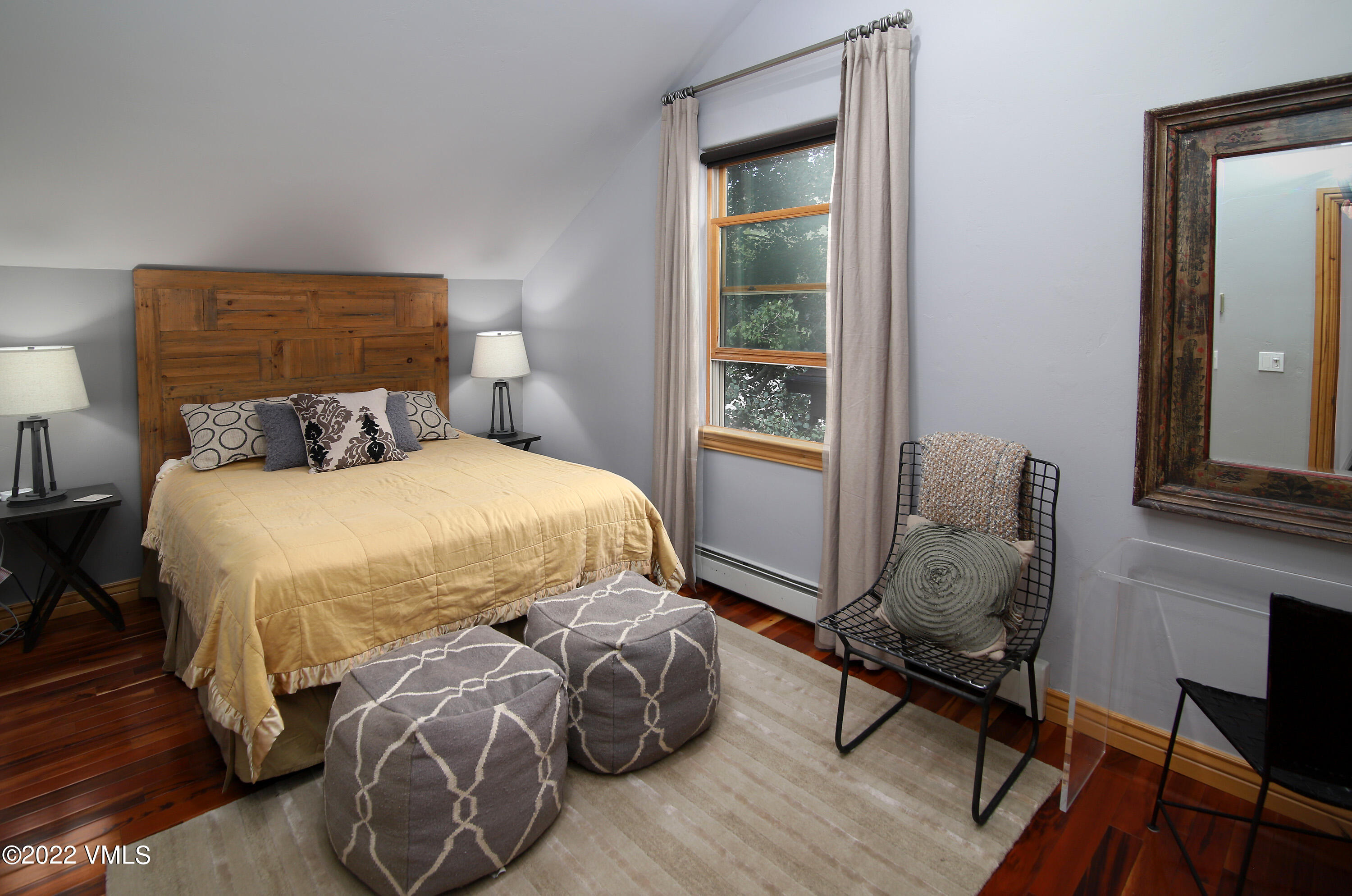 4530 Flat Point, Unit A Avon, CO 81620 - Photo 13 of 22 a bedroom with a bed and a window