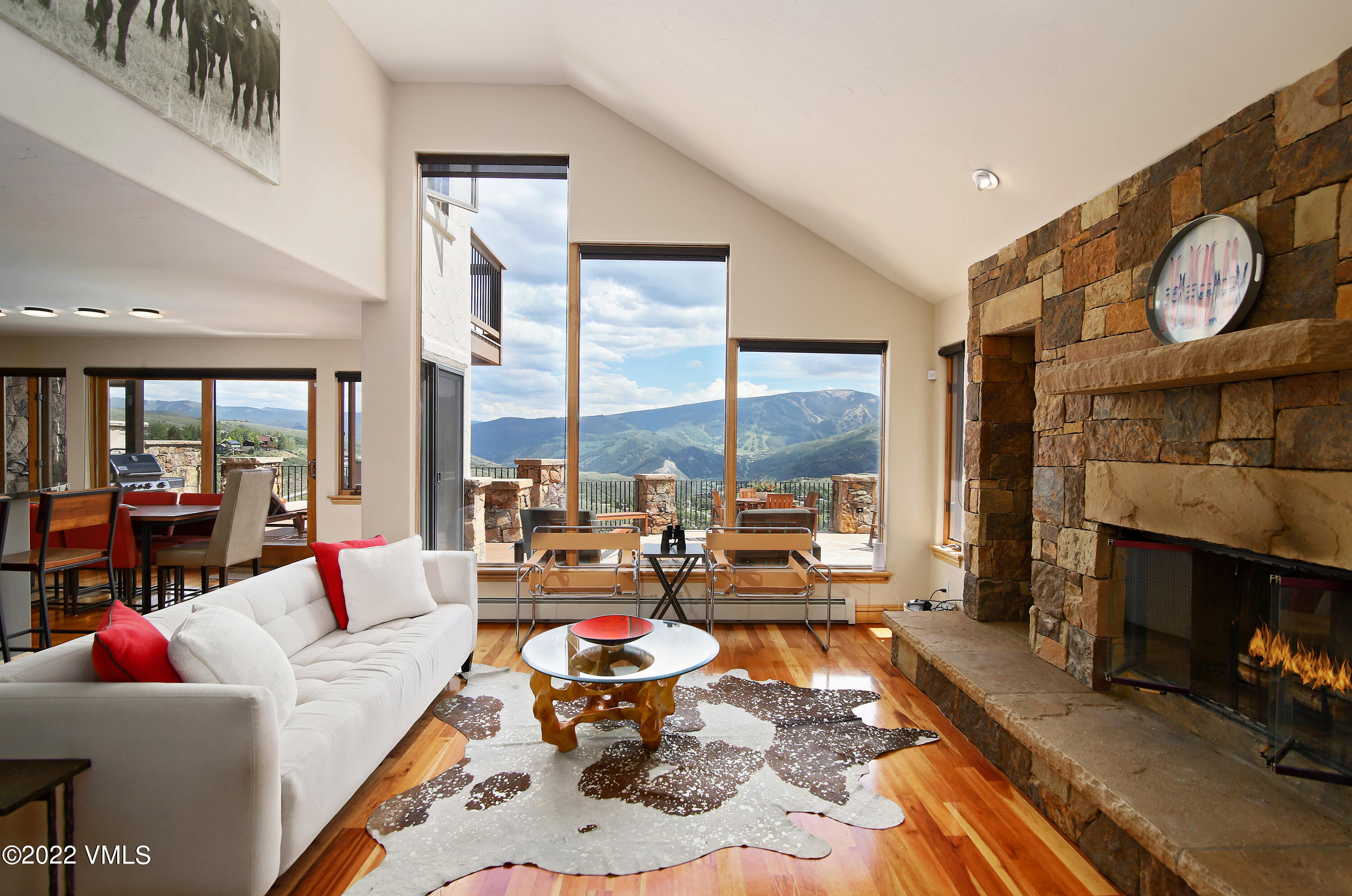 4530 Flat Point, Unit A Avon, CO 81620 - Photo 4 of 22 a living room with furniture and a fireplace