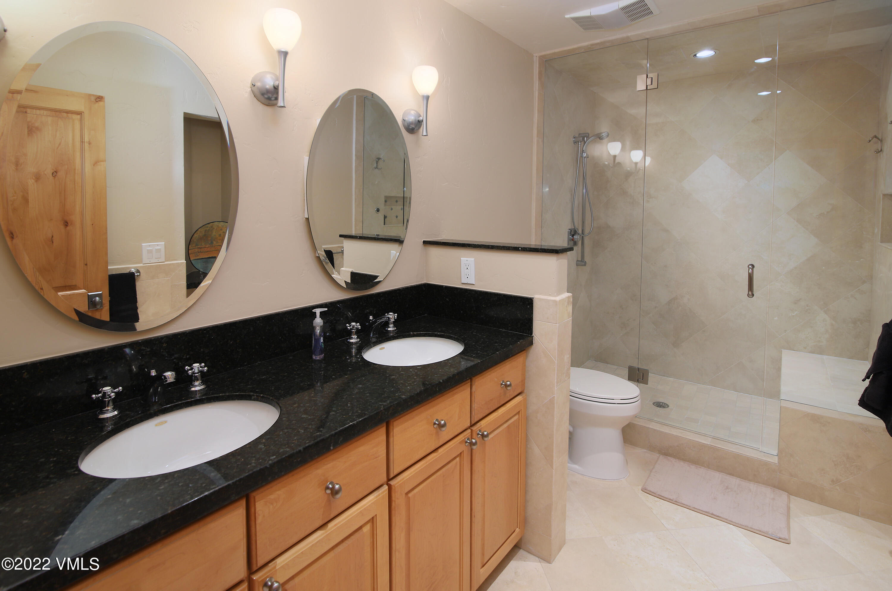 4530 Flat Point, Unit A Avon, CO 81620 - Photo 10 of 22 a bathroom with double sink and a mirror