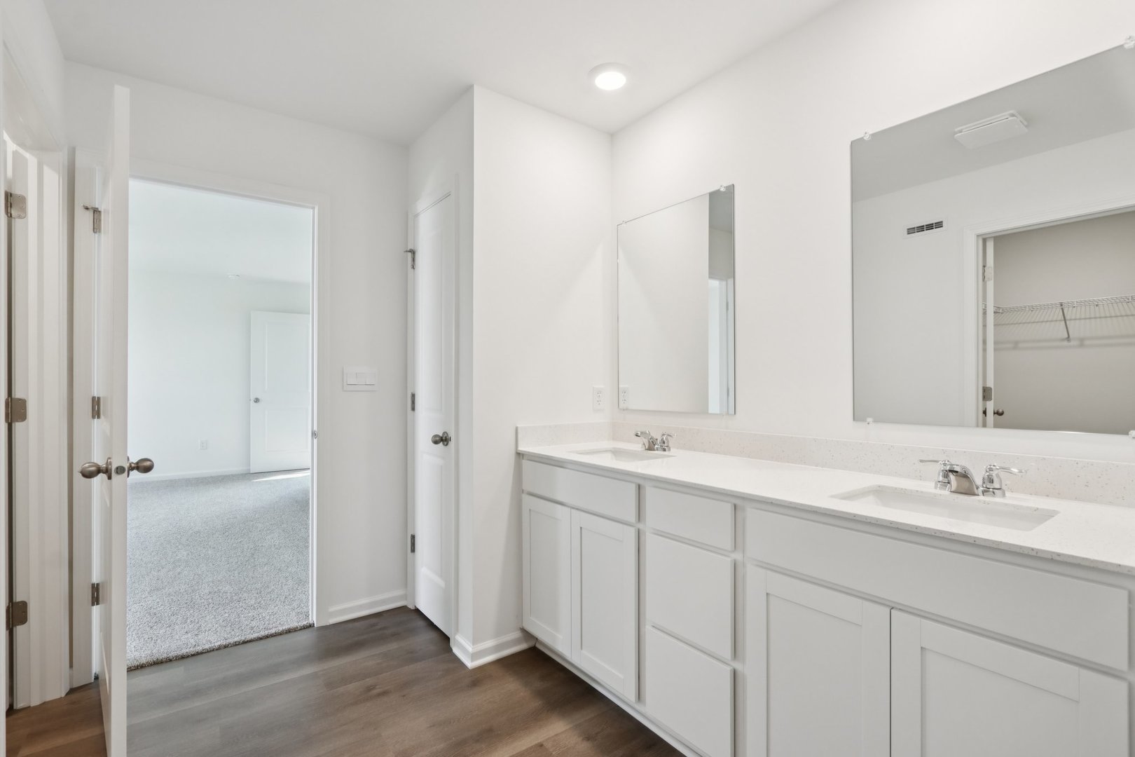 1271 Acadia Circle Pingree Grove, IL 60140 - Photo 13 of 36 a bathroom with a double vanity sink and mirror