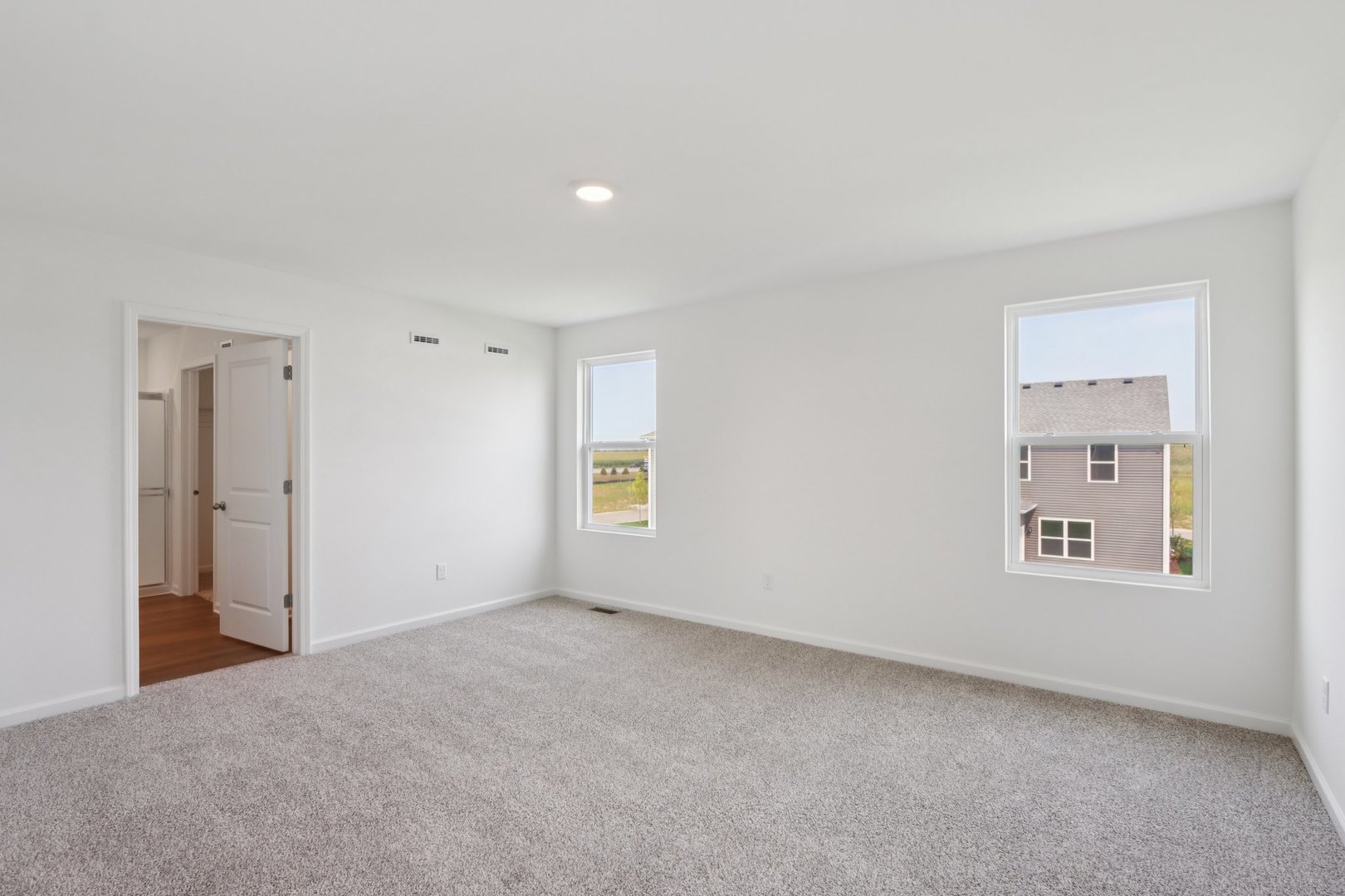 1271 Acadia Circle Pingree Grove, IL 60140 - Photo 9 of 36 a view of an empty room with a window