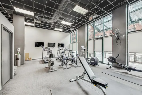 a view of a room with gym equipment