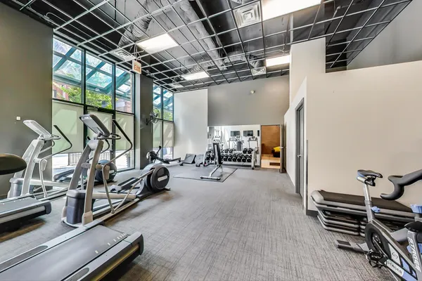 a view of a room with gym equipment
