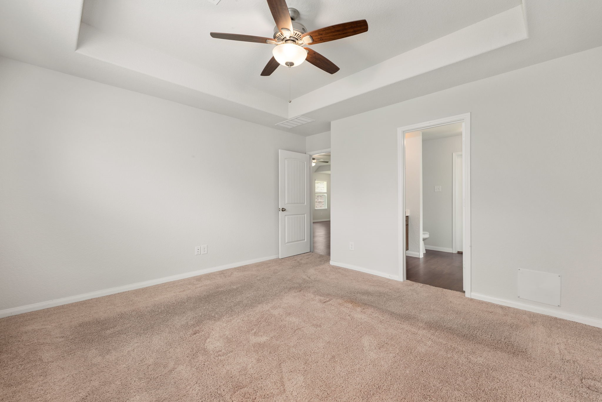 17555 Greystanes Road Humble, TX 77346 - Photo 12 of 28 an empty room with chandelier fan