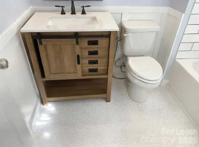a bathroom with a sink and a toilet
