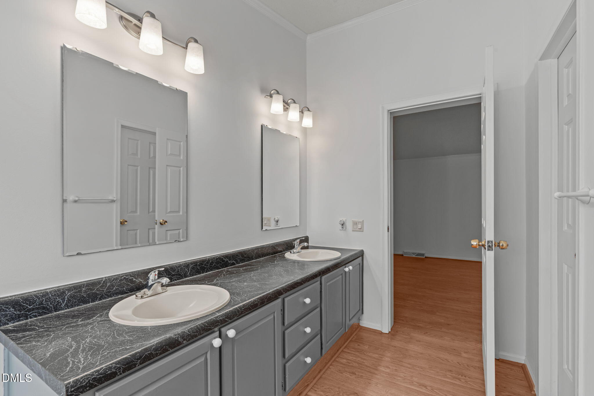 7900 Barbour Store Road Willow Spring, NC 27592 - Photo 17 of 38 a bathroom with a granite countertop sink and a mirror
