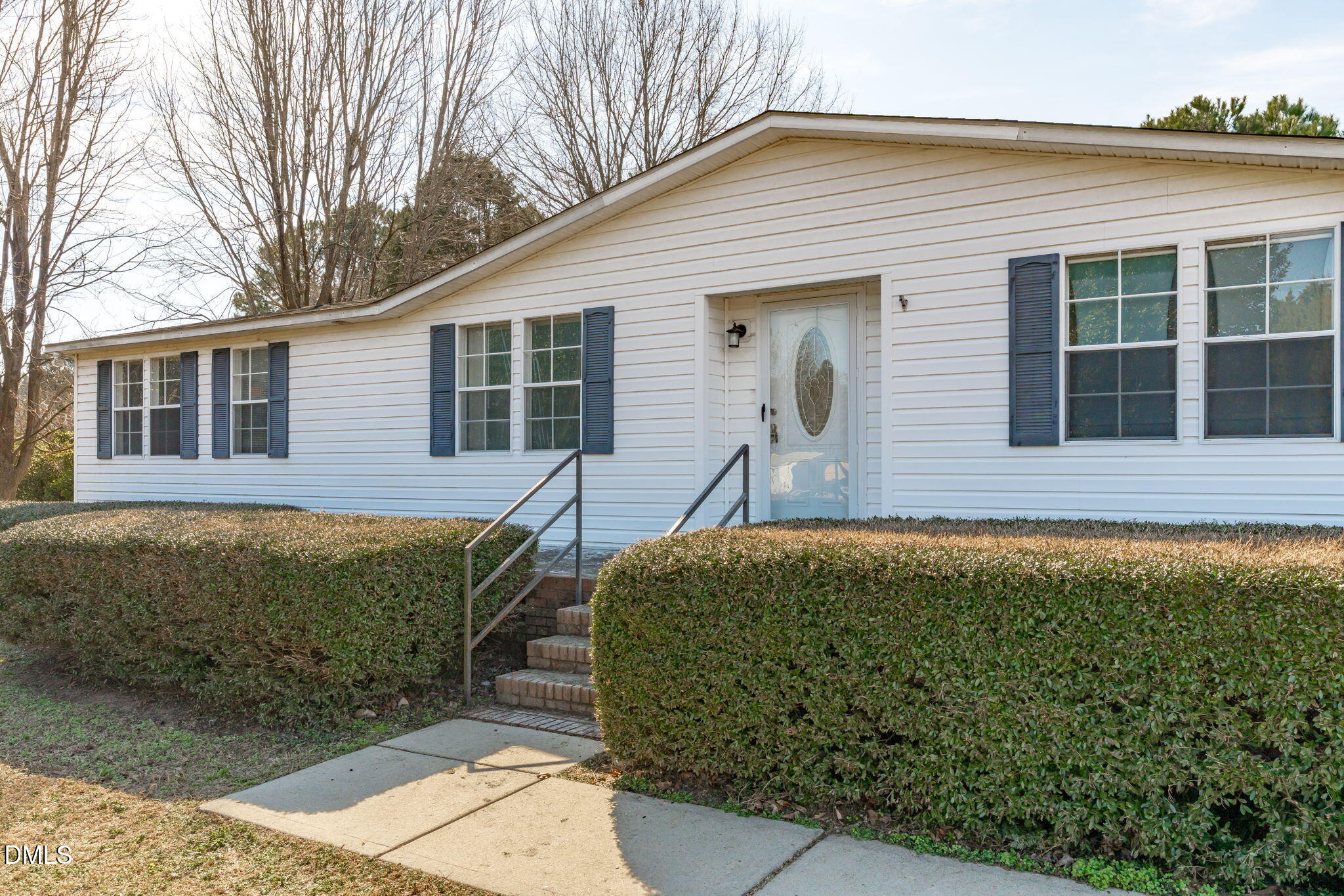 7900 Barbour Store Road Willow Spring, NC 27592 - Photo 2 of 38 a house view with a outdoor space