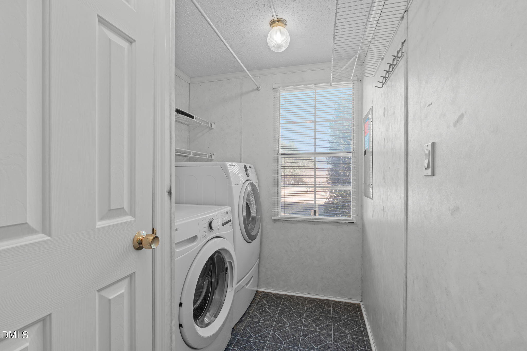 7900 Barbour Store Road Willow Spring, NC 27592 - Photo 24 of 38 a utility room with dryer and washer