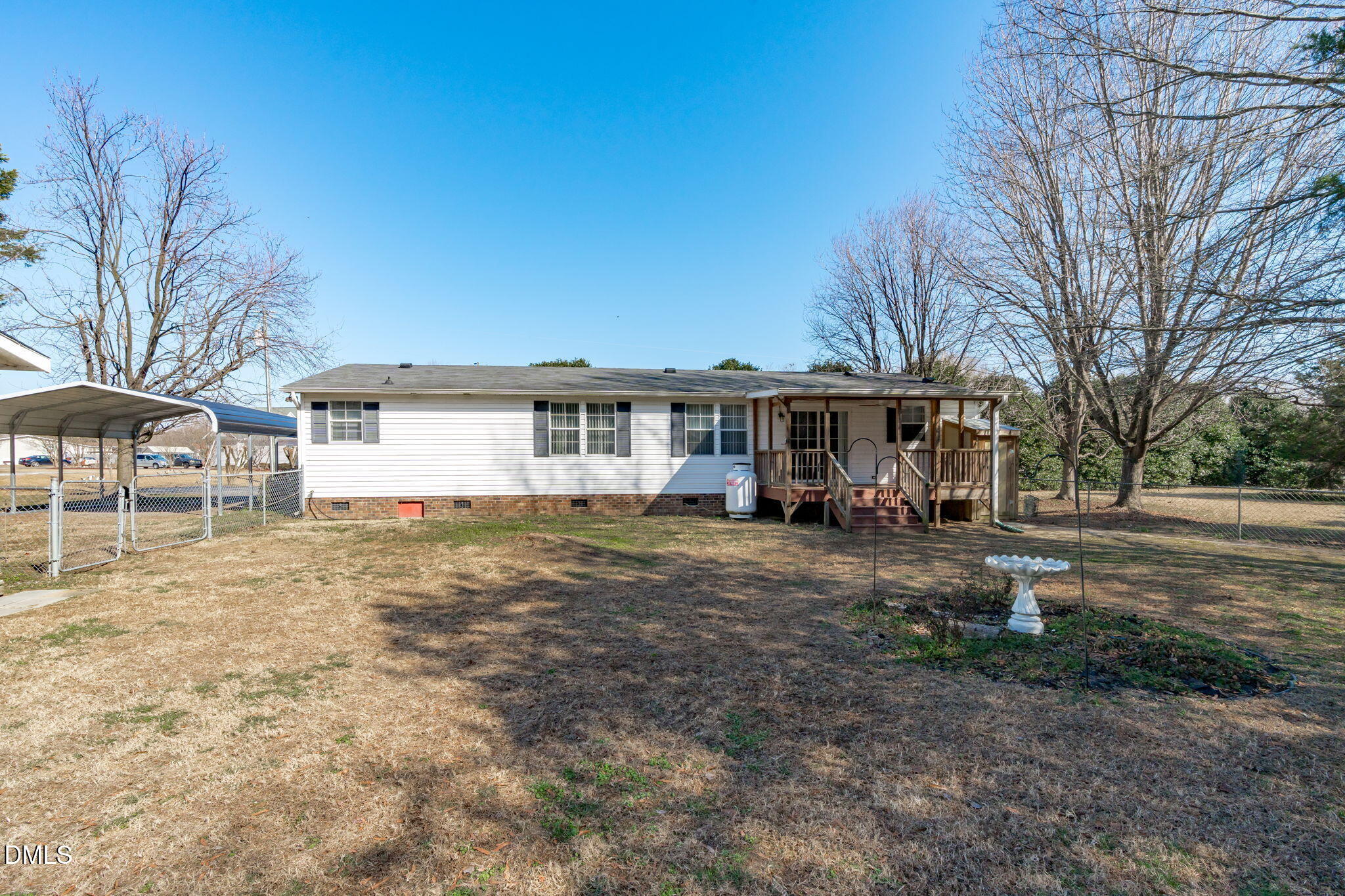 7900 Barbour Store Road Willow Spring, NC 27592 - Photo 27 of 38 a view of a house with a yard