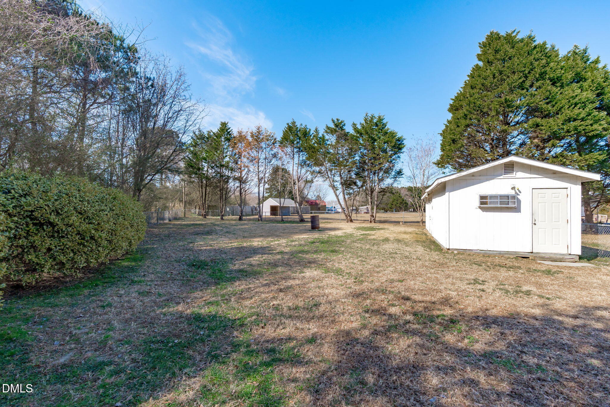 7900 Barbour Store Road Willow Spring, NC 27592 - Photo 30 of 38 a view of outdoor space with trees