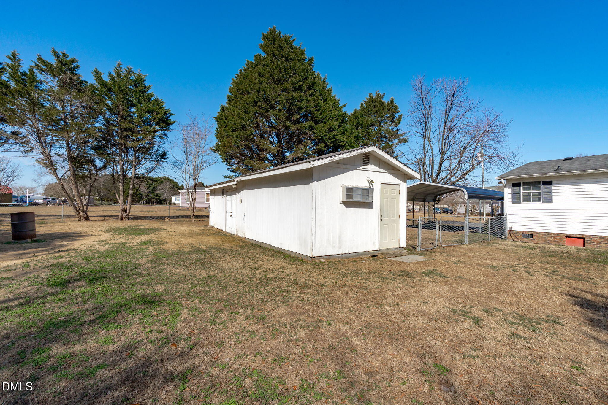 7900 Barbour Store Road Willow Spring, NC 27592 - Photo 31 of 38 a view of a house with a yard