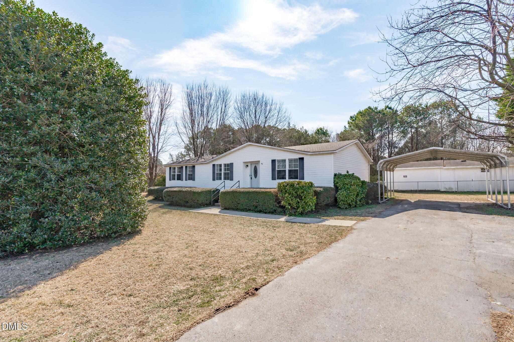 7900 Barbour Store Road Willow Spring, NC 27592 - Photo 32 of 38 a view of a front of house with a yard