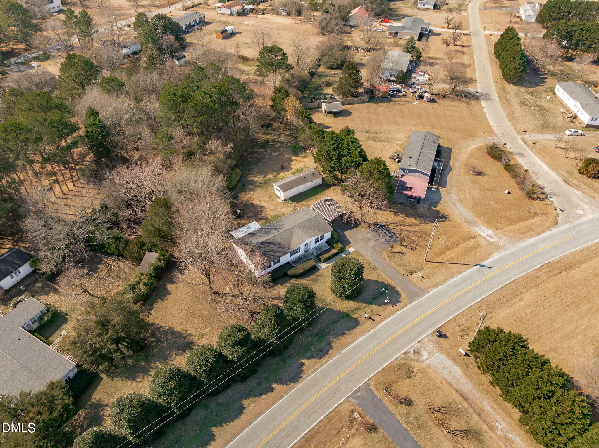 7900 Barbour Store Road Willow Spring, NC 27592 - Photo 35 of 38 an aerial view of a house with a yard