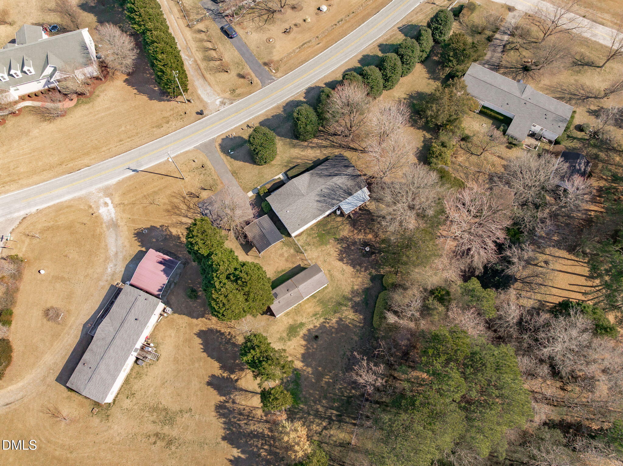 7900 Barbour Store Road Willow Spring, NC 27592 - Photo 37 of 38 an aerial view of a house with a yard