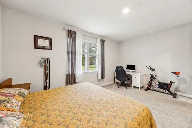 a view of living room kitchen with furniture and window