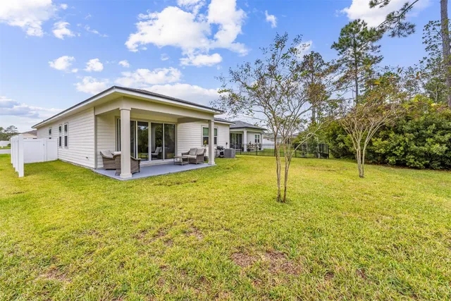 a view of a lake with a big yard