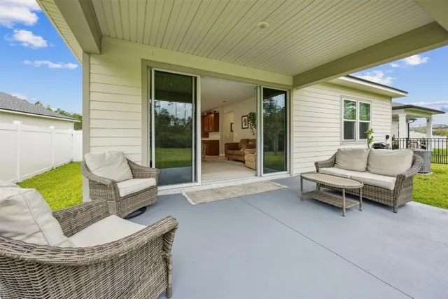 a bedroom with a bed dresser and a window