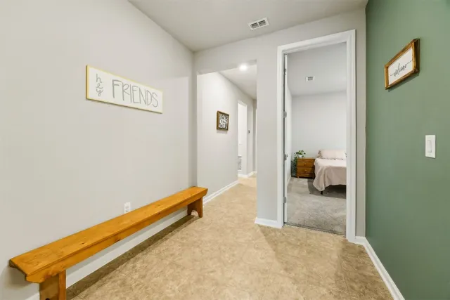 view of a bathroom with a tub and shower