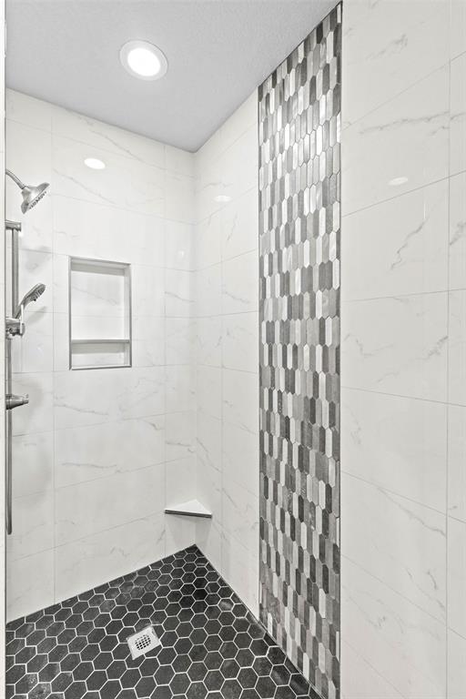 934 North Maple Street Muenster, TX 76252 - Photo 17 of 39 a bathroom with a shower curtain and a sink