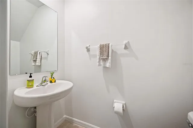 a bathroom with a sink and a toilet