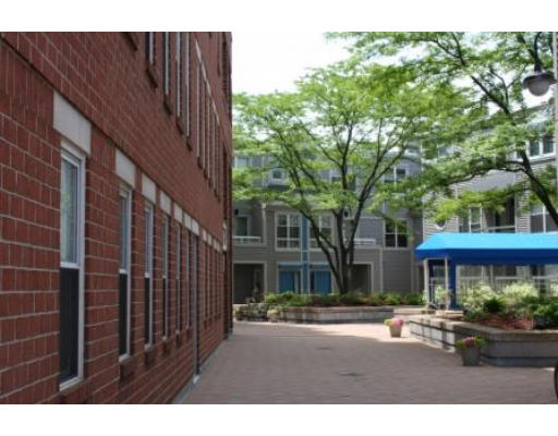 20 Chestnut Street, Unit 406 Cambridge, MA 02139 - Photo 3 of 17 a view of an apartment with a barbeque