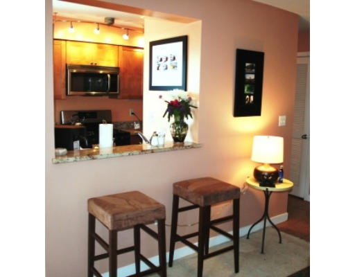 20 Chestnut Street, Unit 406 Cambridge, MA 02139 - Photo 6 of 17 a dining room with furniture and wooden floor