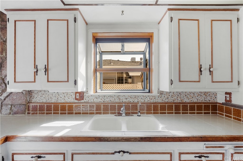 7119 Cortland Avenue Paramount, CA 90723 - Photo 14 of 30 a view of a bathroom sink and a window