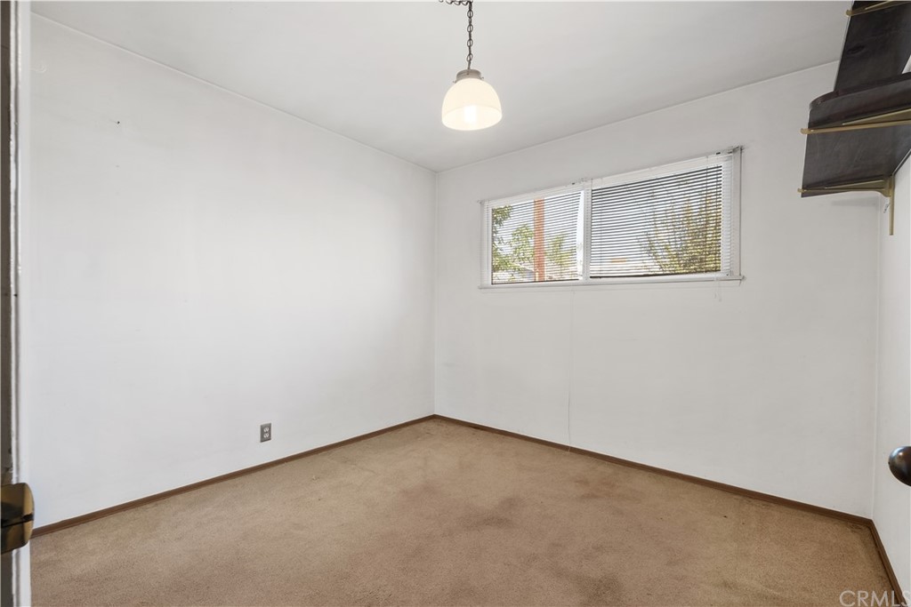 7119 Cortland Avenue Paramount, CA 90723 - Photo 22 of 30 a view of an empty room with a window