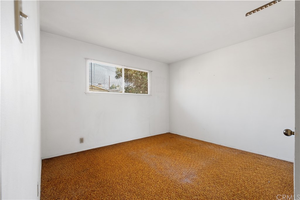 7119 Cortland Avenue Paramount, CA 90723 - Photo 23 of 30 an empty room with a window