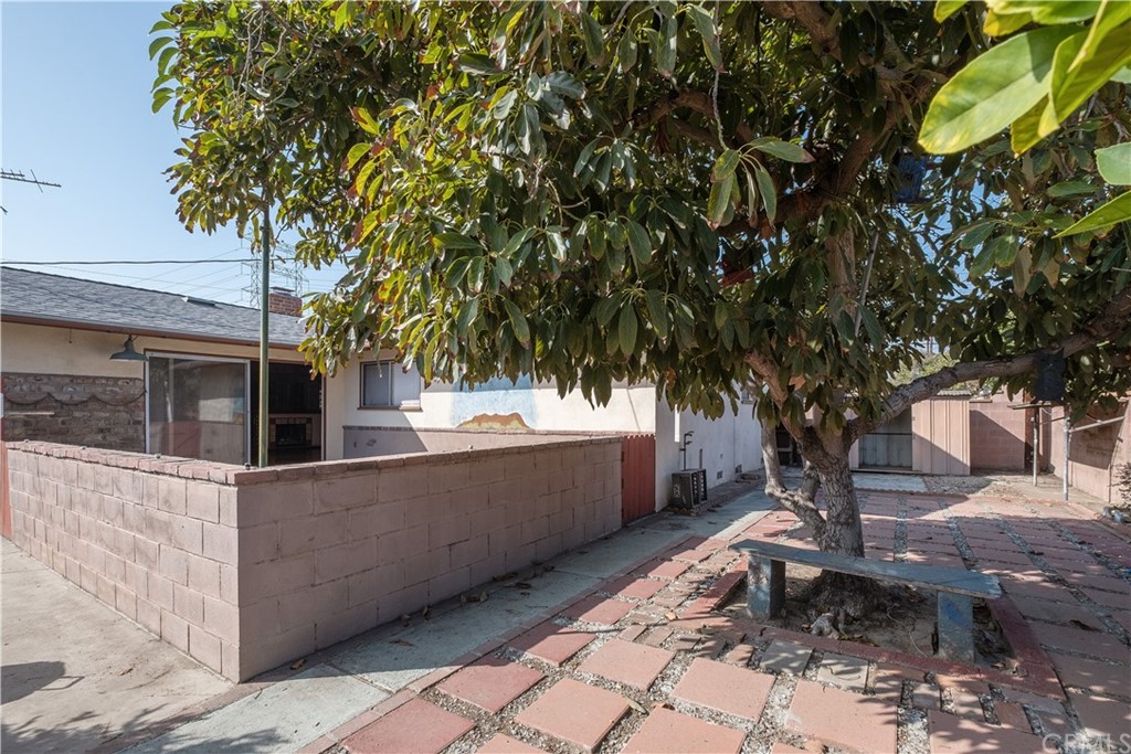 7119 Cortland Avenue Paramount, CA 90723 - Photo 29 of 30 a view of a chairs setting on the backyard