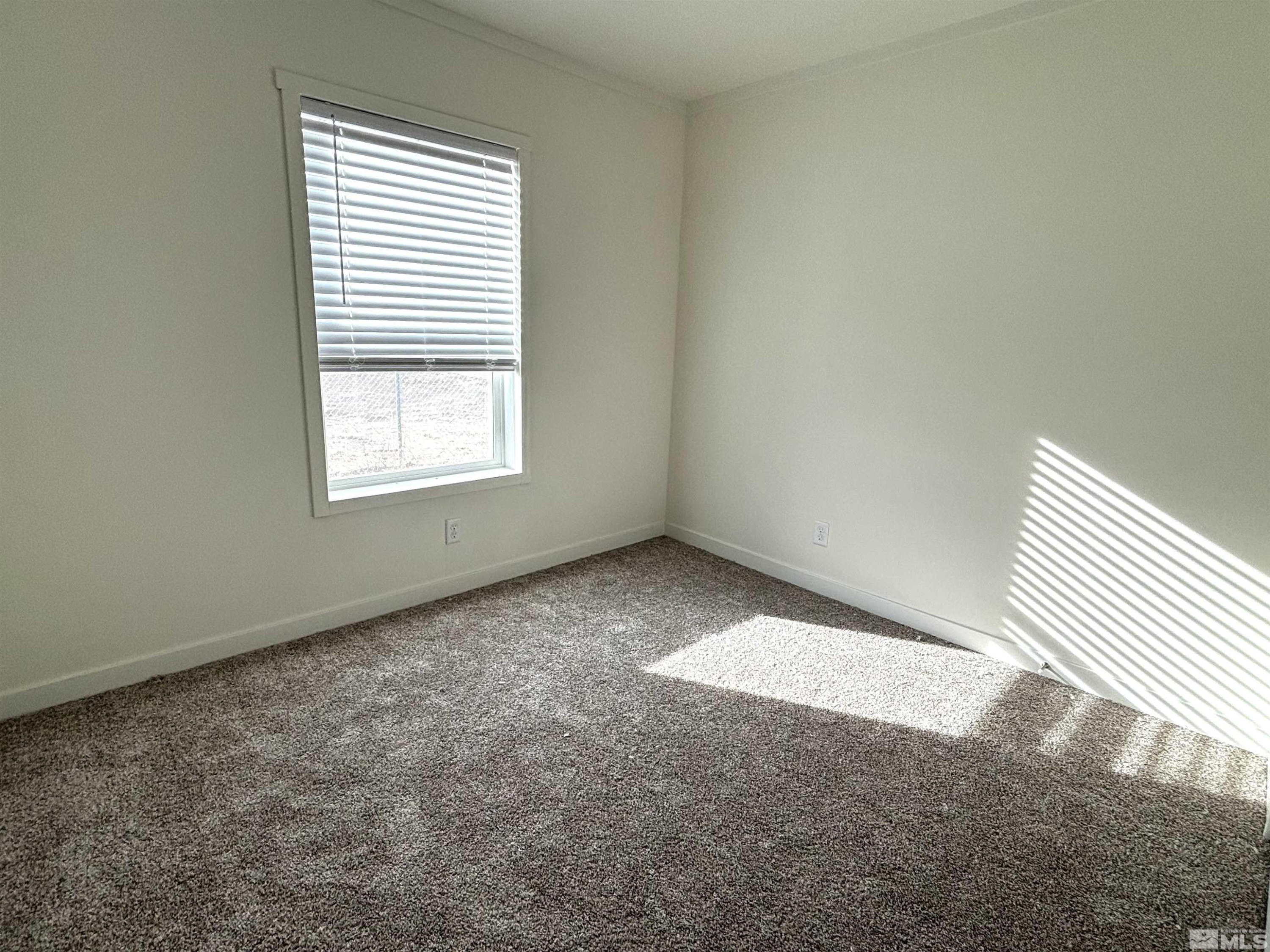 475 Camellia Way Lovelock, NV 89419 - Photo 16 of 23 an empty room with a window