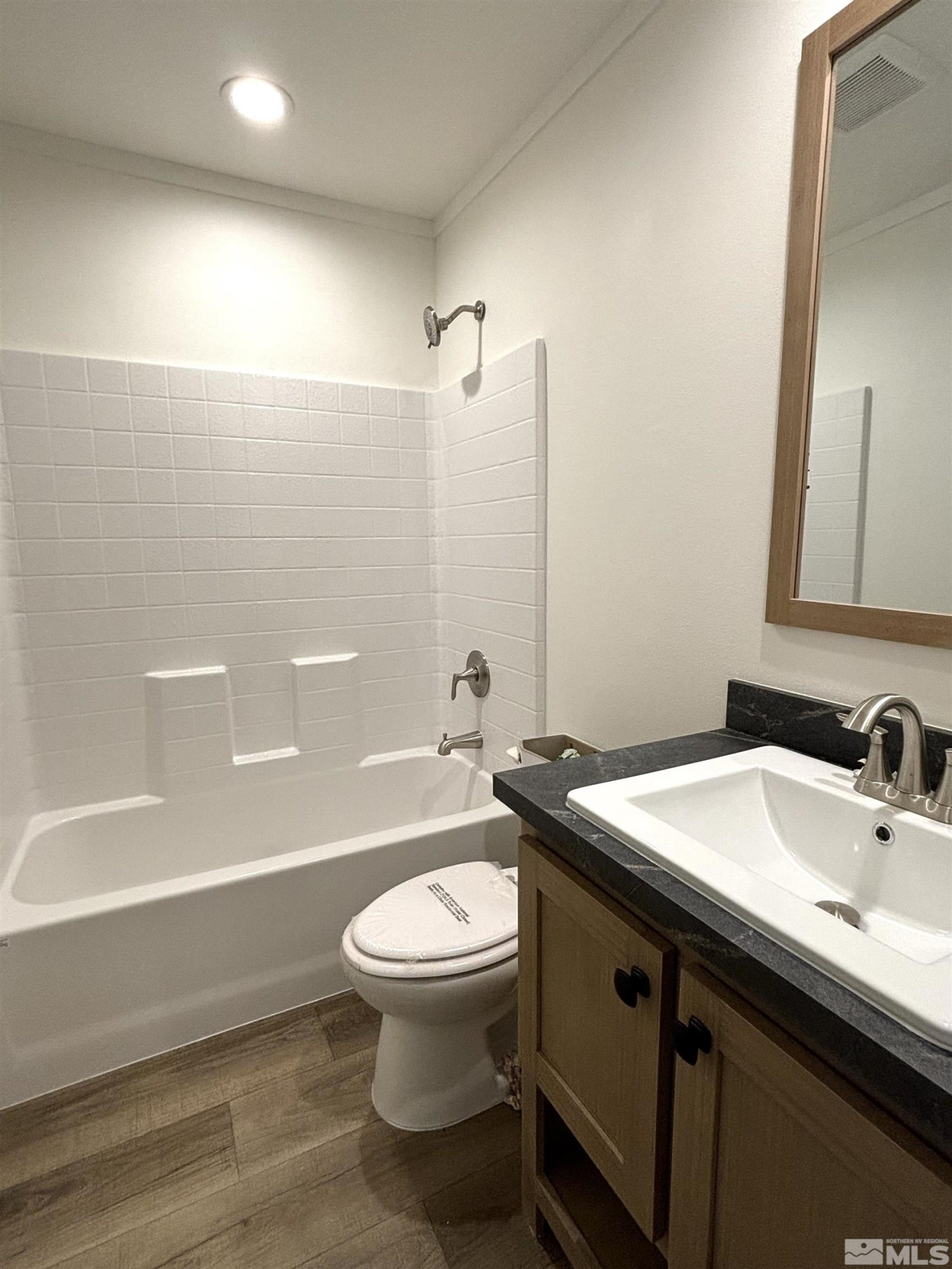 475 Camellia Way Lovelock, NV 89419 - Photo 18 of 23 a bathroom with a sink a toilet and shower