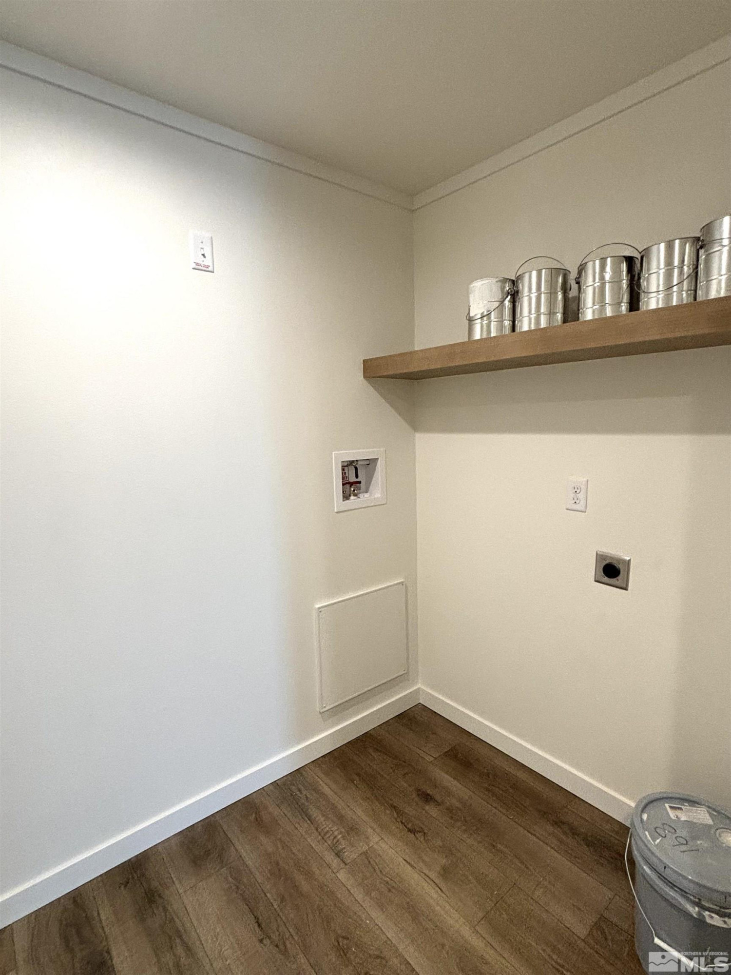 475 Camellia Way Lovelock, NV 89419 - Photo 22 of 23 a view of a closet with wooden floor