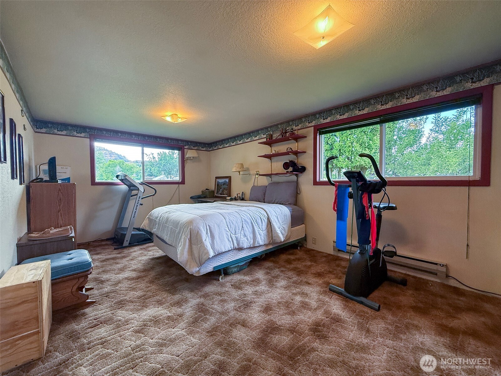 518 Bridge Street Twisp, WA 98856 - Photo 19 of 40 a bedroom with a bed and a couch