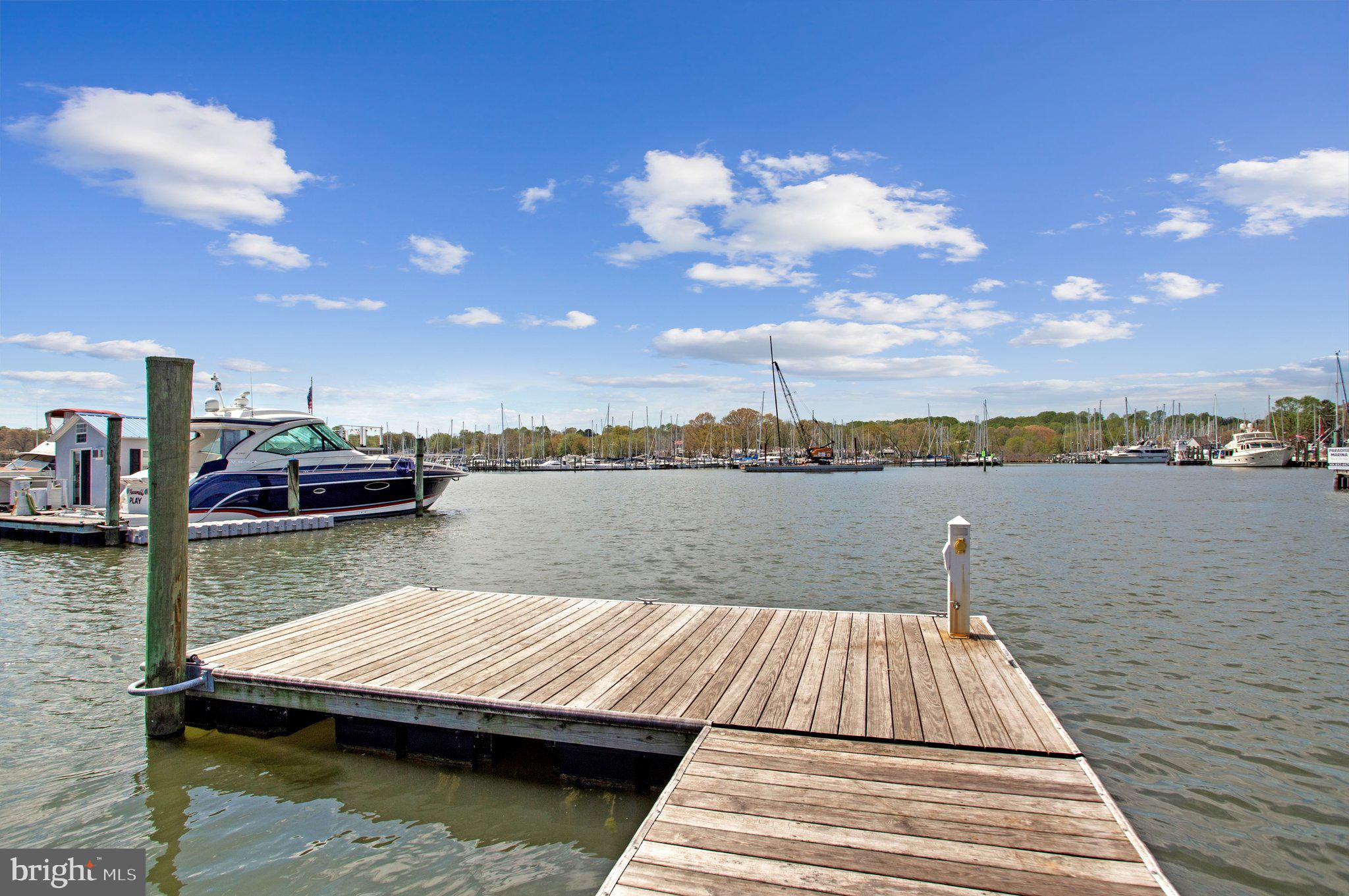 6146 Drum Point Road Deale, MD 20751 - Photo 59 of 75 a view of house next to a lake with houses