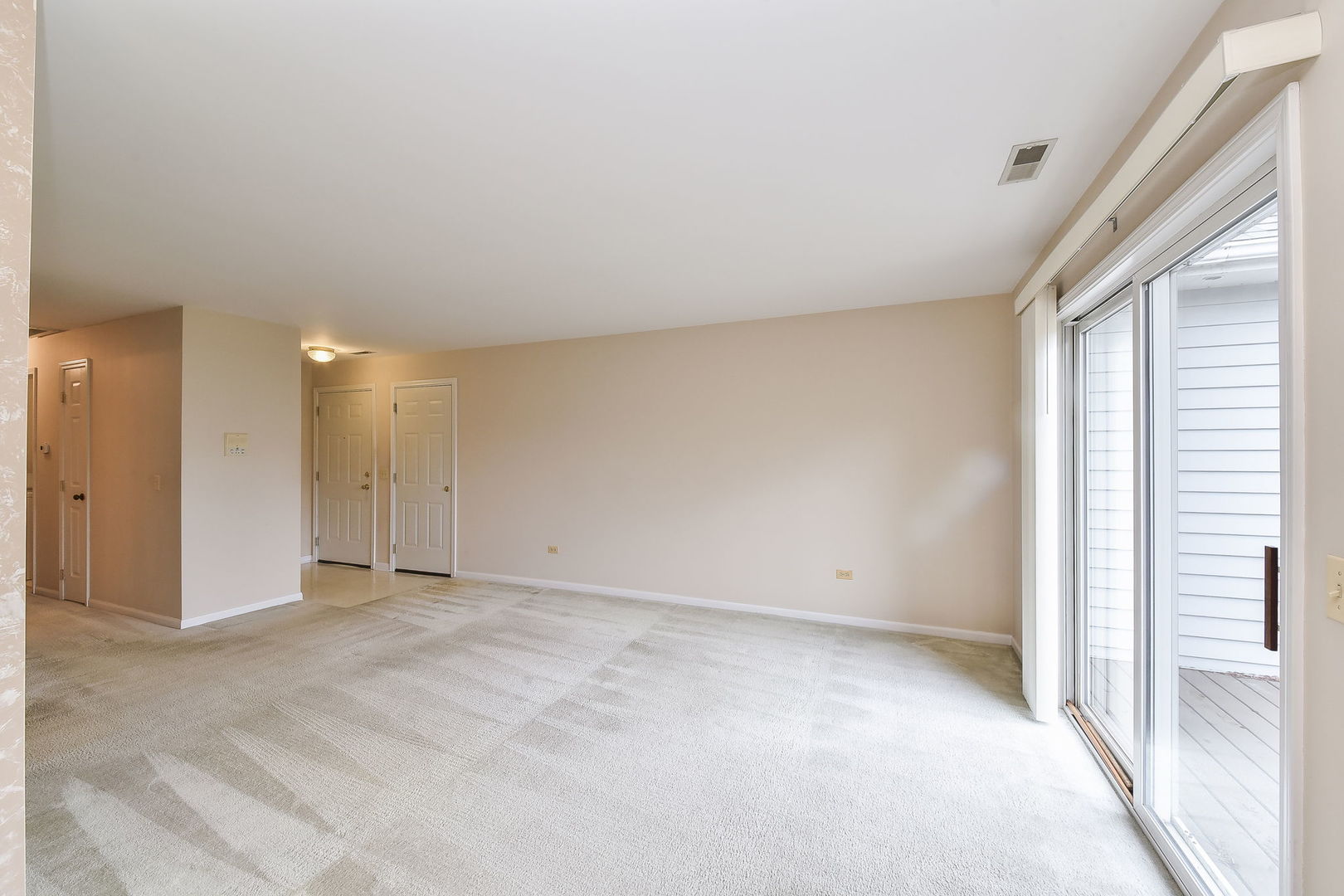 899 Golf Course Road, Unit 3 Crystal Lake, IL 60014 - Photo 4 of 14 a view of an empty room with a window
