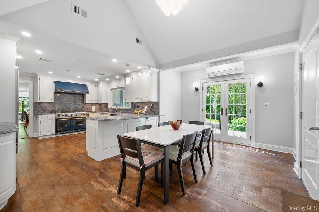 22 Crane Road Scarsdale, NY 10583 - Photo 9 of 32 Breakfast area with French doors opening onto a lovely deck.