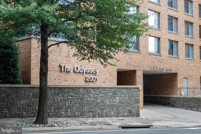 a front view of a building with garden