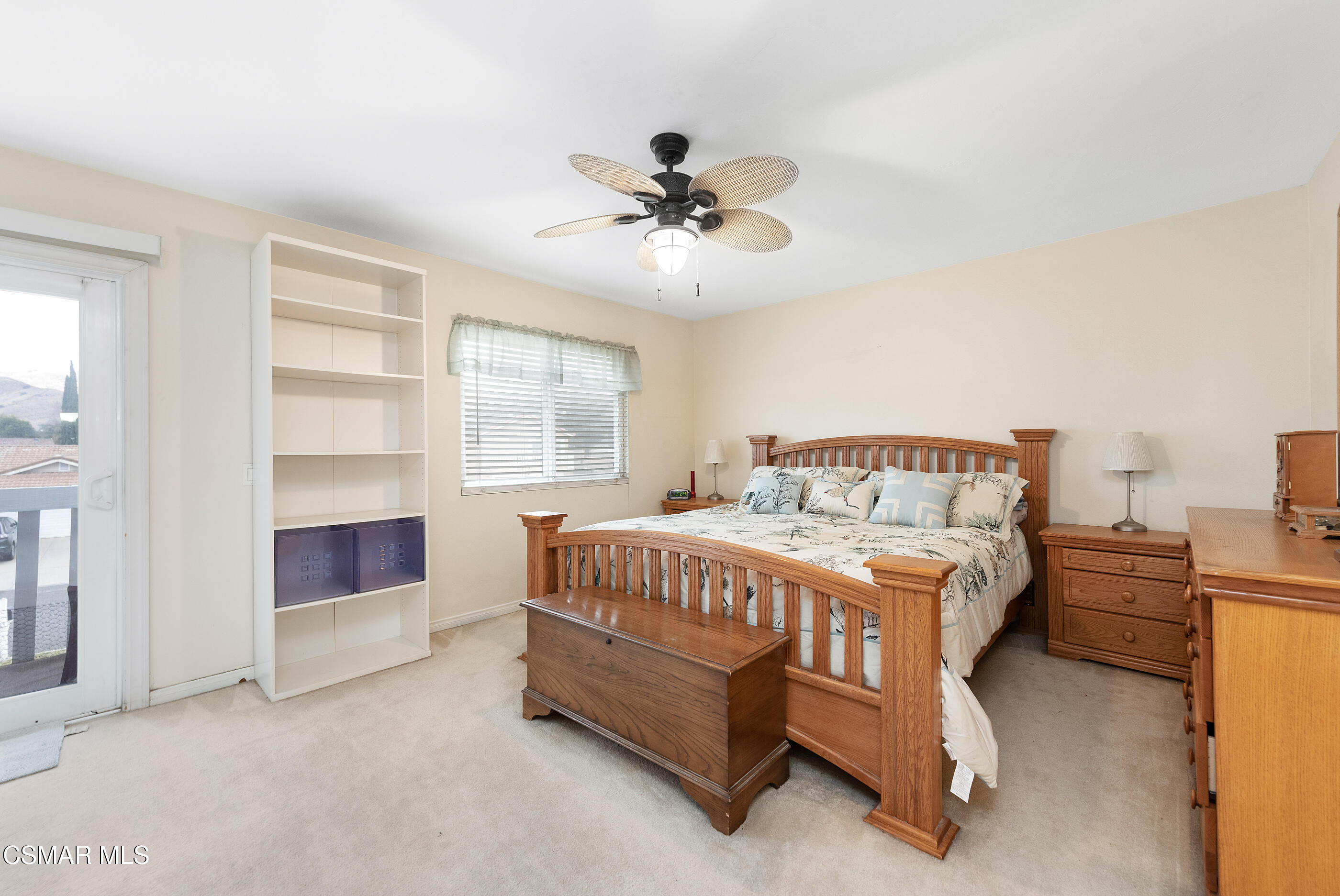 6464 Hazel Circle Simi Valley, CA 93063 - Photo 19 of 42 a bedroom with a bed and a ceiling fan