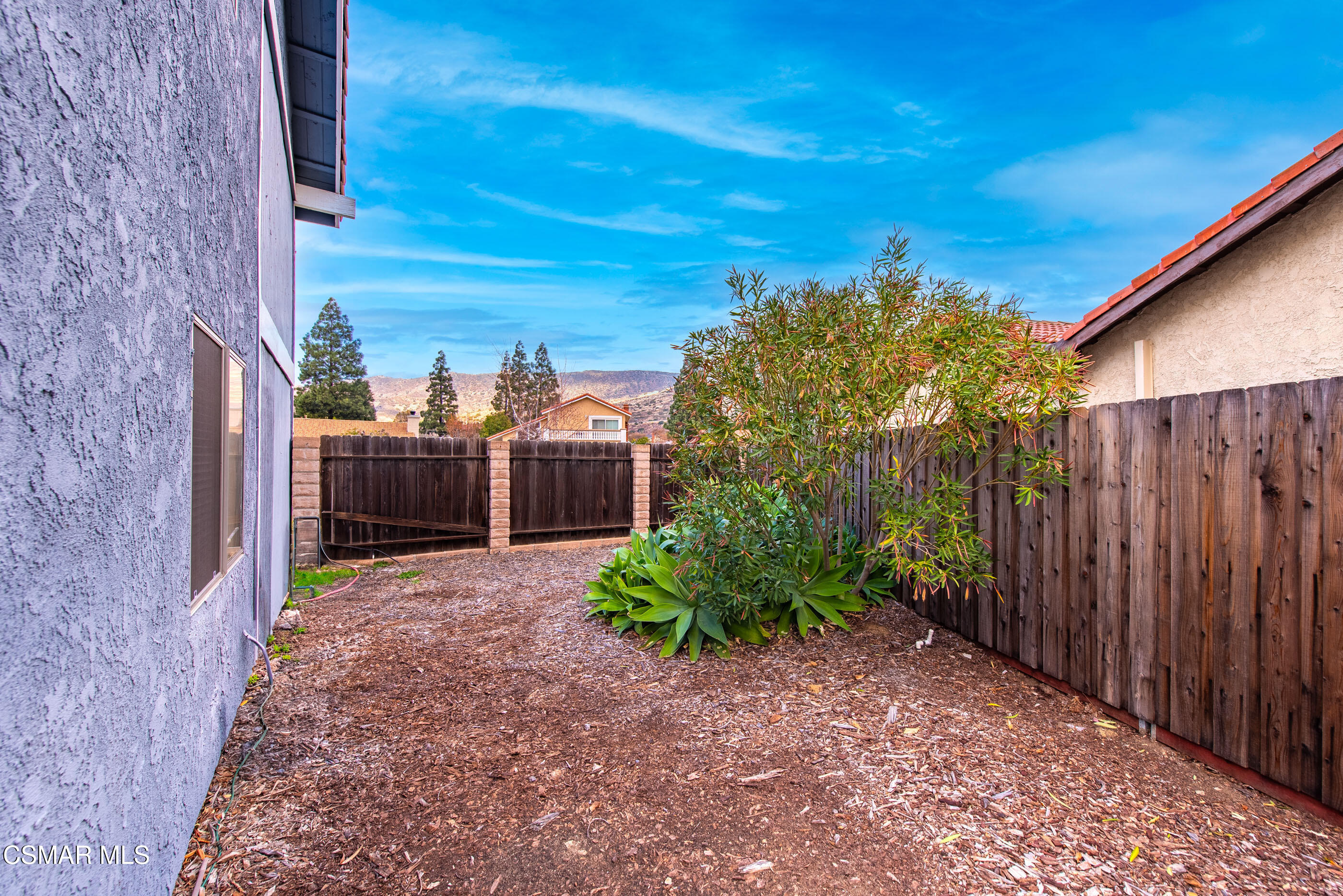 6464 Hazel Circle Simi Valley, CA 93063 - Photo 37 of 42 a view of a backyard with plants